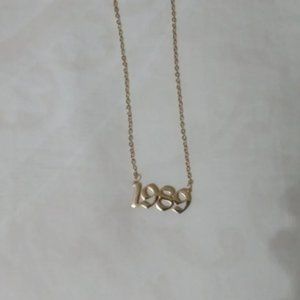 Taylor Swift 1989 gold necklace brand new!